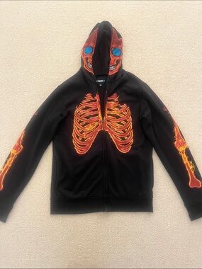Tony Hawk Black Hoodie with Orange Flame Skull and Blue Eye Accents